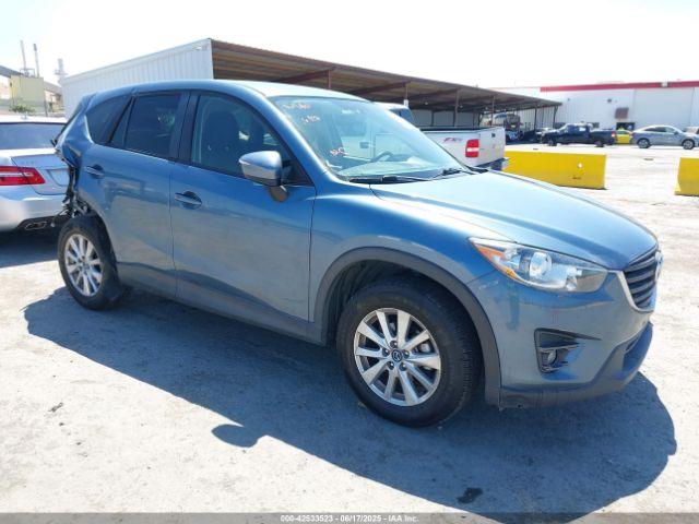  Salvage Mazda Cx