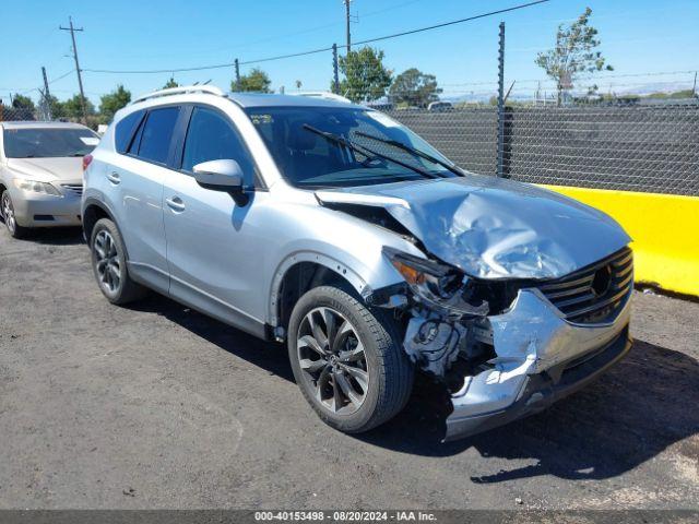  Salvage Mazda Cx
